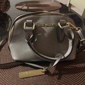 Steve Madden grey over the body bag.